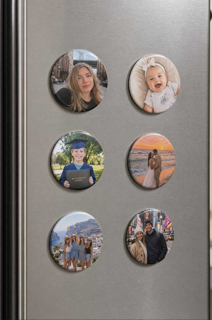 2.25 inch round photo magnets on a stainless steel fridge, six portraits of family and a baby