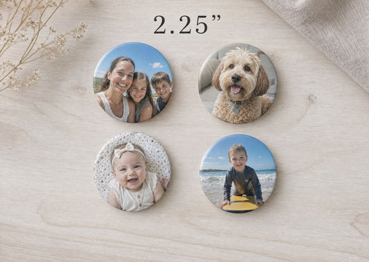 2.25 inch round photo magnets: four circle magnets with family, dog, baby and beach photos on a light wooden table